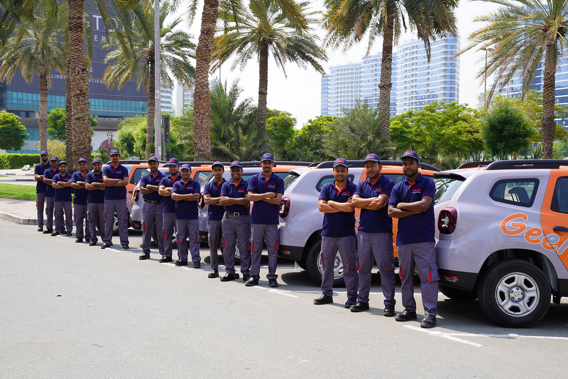 GeeM Home Team Members with Car